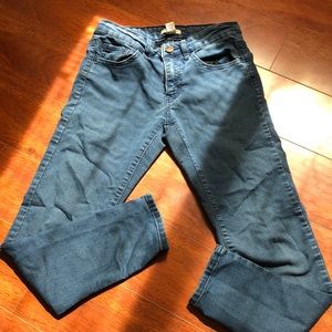 Dark washed blue jeans